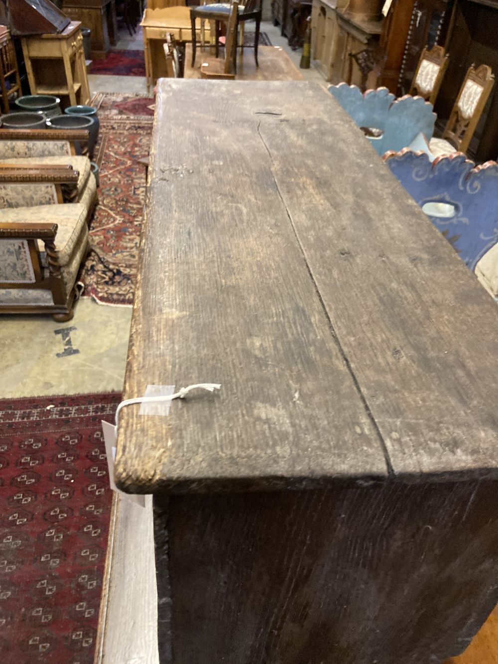 An 18th century oak panelled coffer, width 98cm depth 35cm height 60cm